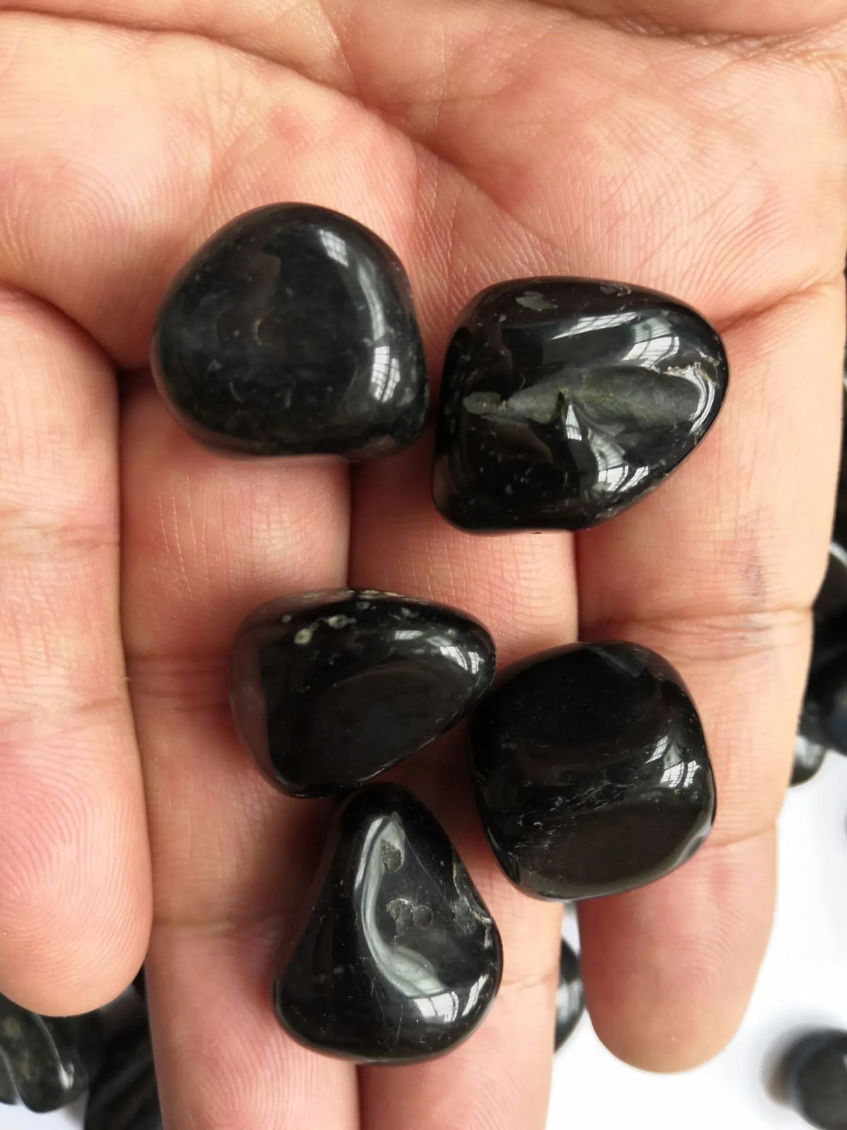 Schwarzer Onyx Trommelstein
