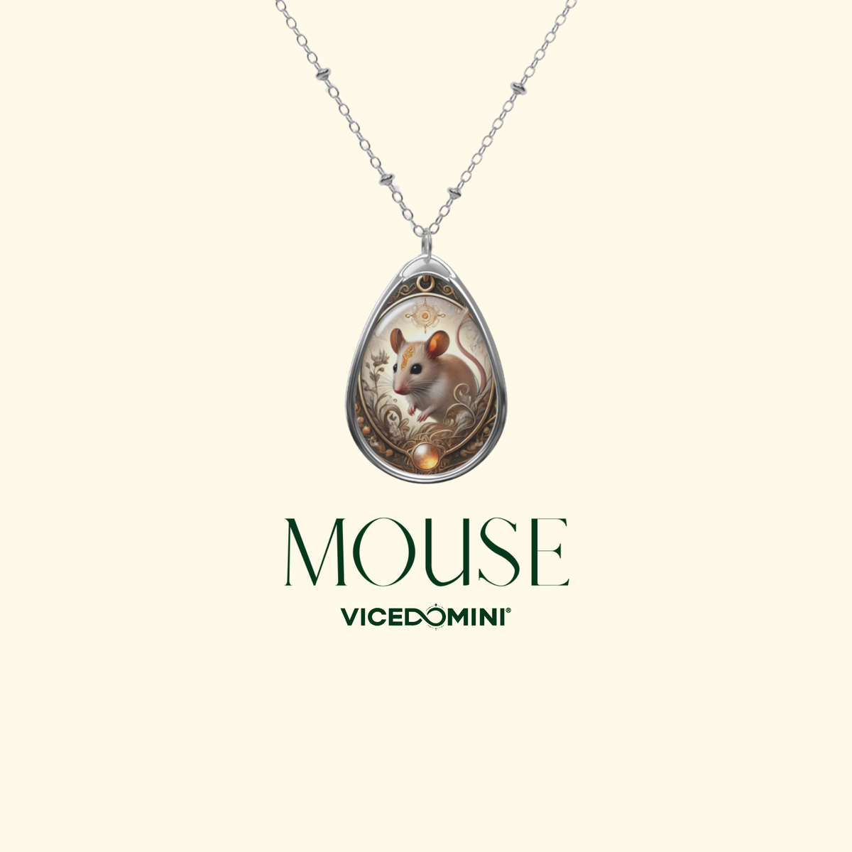 A silver teardrop pendant necklace featuring an illustrated mouse in a decorative frame, suspended from a delicate silver chain on a light cream background. The text 'MOUSE' and 'VICEDOMINI' appears below the pendant.