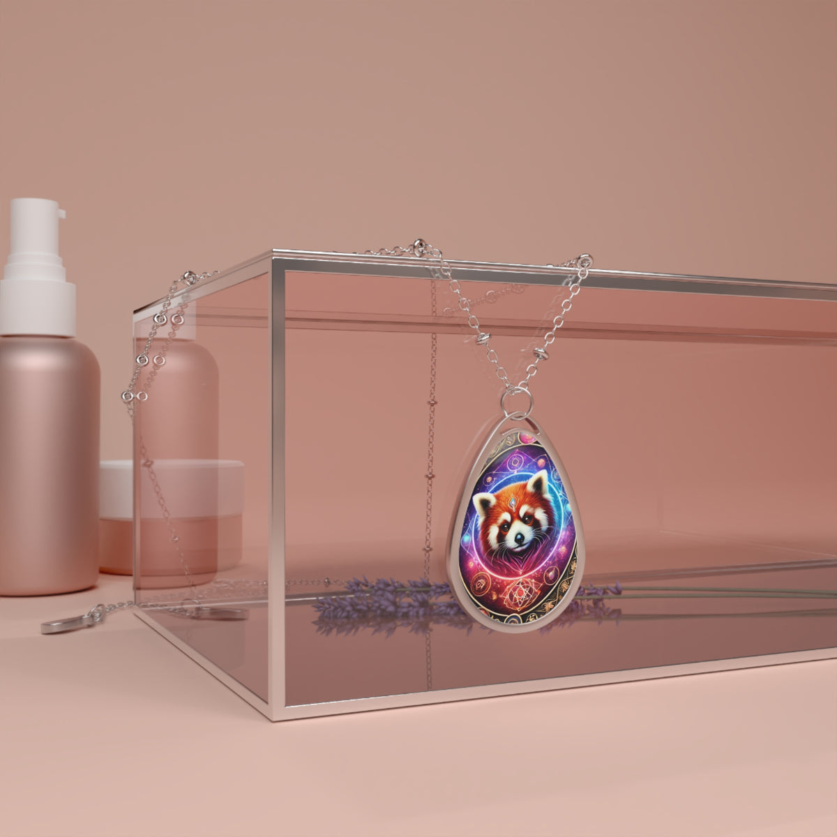 A red panda-themed pendant necklace draped over a transparent jewelry box with soft pink cosmetic bottles in the background. The pendant’s celestial artwork glows against the neutral tones of the setting.