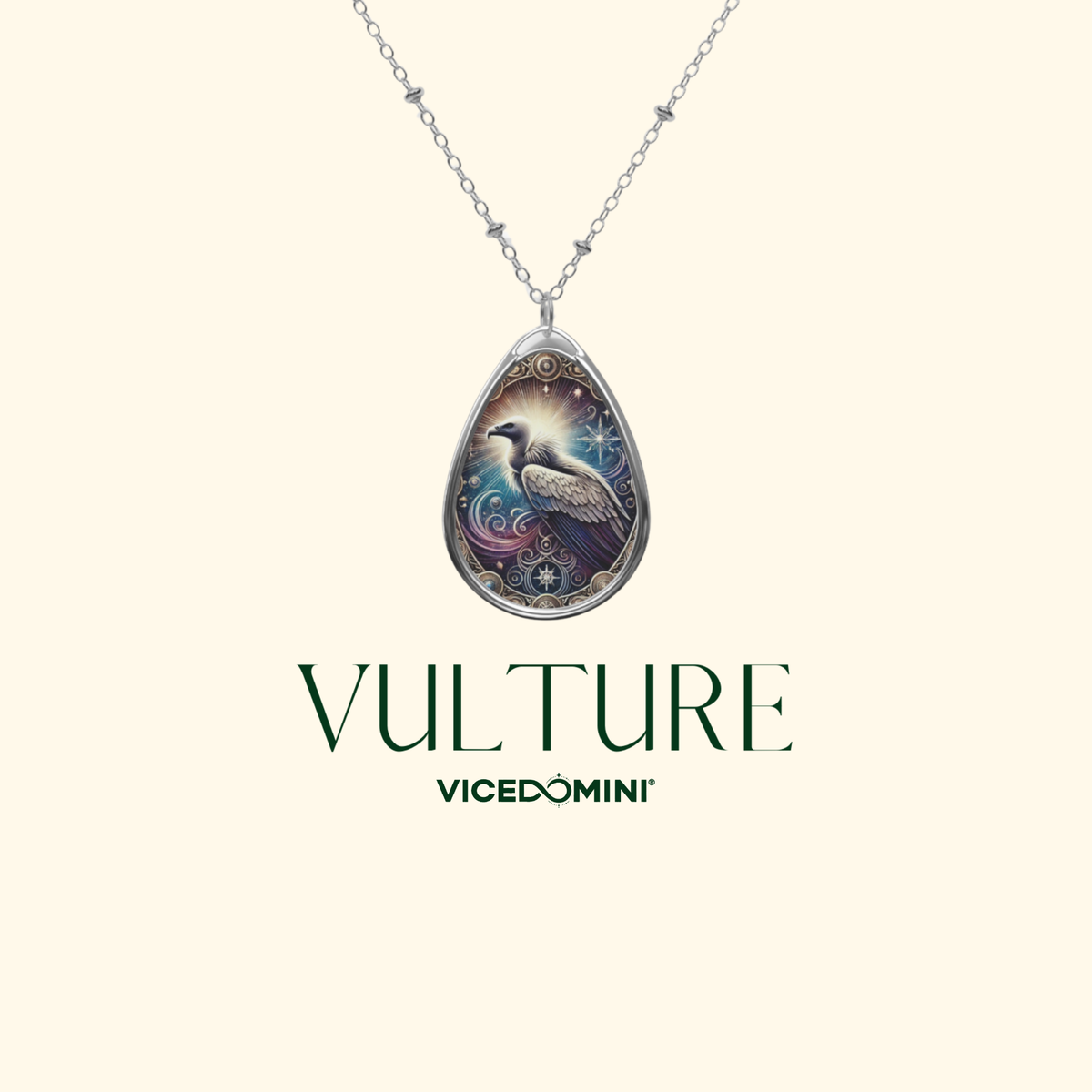 A close-up image of a vulture-themed necklace with detailed engravings and a glowing celestial aura, presented on a soft cream background. The words "VULTURE" and "VICEDOMINI" are elegantly written below.