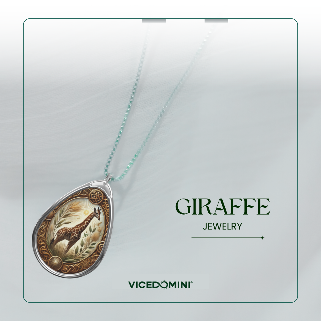 A teardrop-shaped pendant necklace featuring an engraved giraffe and floral design in warm gold and brown tones, suspended from a delicate mint green chain. The pendant is displayed on a light gray background with a thin green border, alongside the text 'GIRAFFE JEWELRY' and the brand name 'VICEDOMINI'.