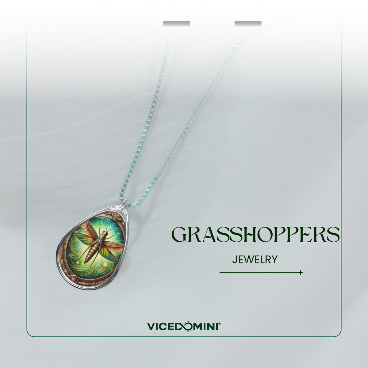 A necklace with a teardrop-shaped pendant featuring an illustrated grasshopper on a green and gold background, suspended from a light aqua chain. The pendant is displayed on a white card labeled 'GRASSHOPPERS JEWELRY' with the brand 'VICEDOMINI' at the bottom.