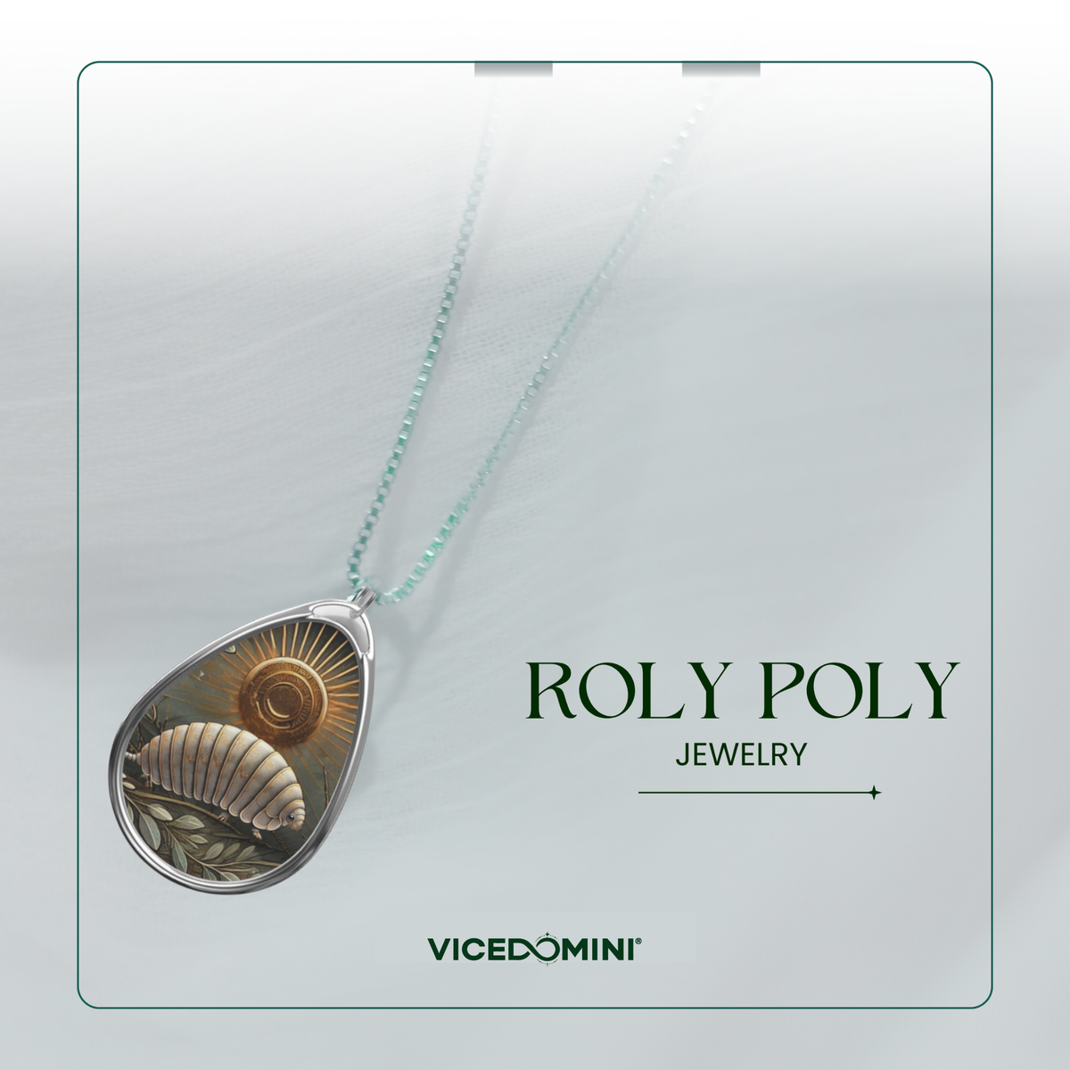 A teardrop-shaped pendant necklace with a silver-toned frame featuring a detailed seashell illustration and a gold sunburst, suspended from a light mint-green chain. The necklace is displayed on a light gray textured card with the text 'ROLY POLY JEWELRY' and 'VICEDOMINI' below it.