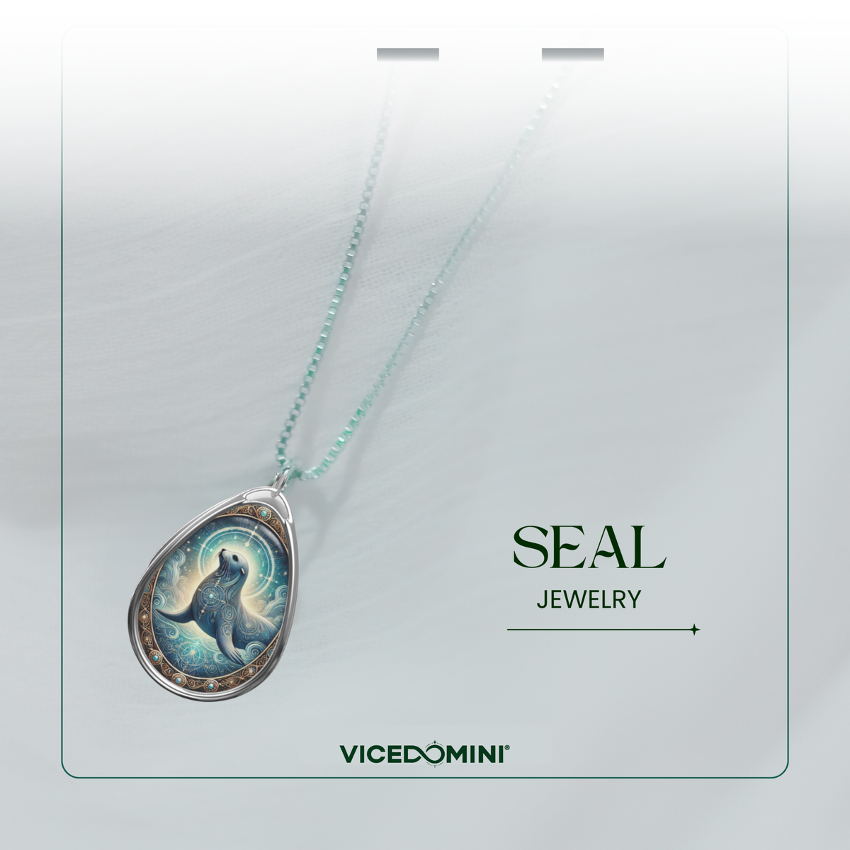 A mystical seal pendant necklace with a silver frame and delicate detailing, hanging from a beaded chain. The pendant design includes celestial and oceanic motifs, creating a luminous effect. The background is soft and airy, with the text "SEAL JEWELRY" and "VICEDOMINI" visible.