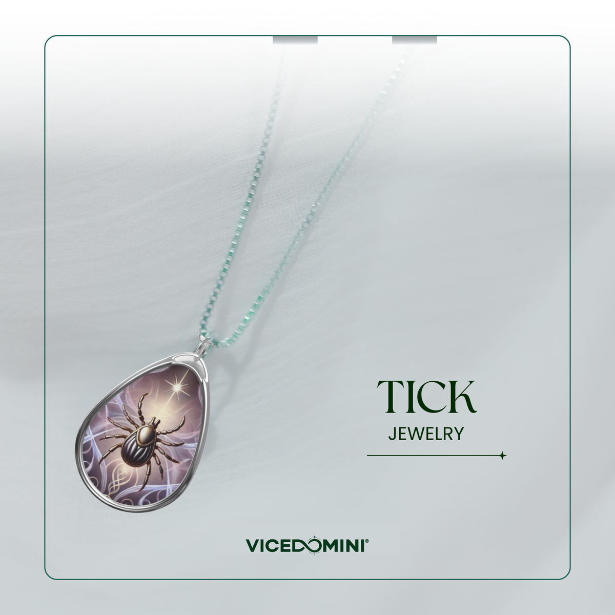 A teardrop-shaped pendant necklace from Vicedomini Tick Jewelry, featuring a detailed beetle illustration on a purple and gray background, suspended from a light mint green chain against a soft gray background.