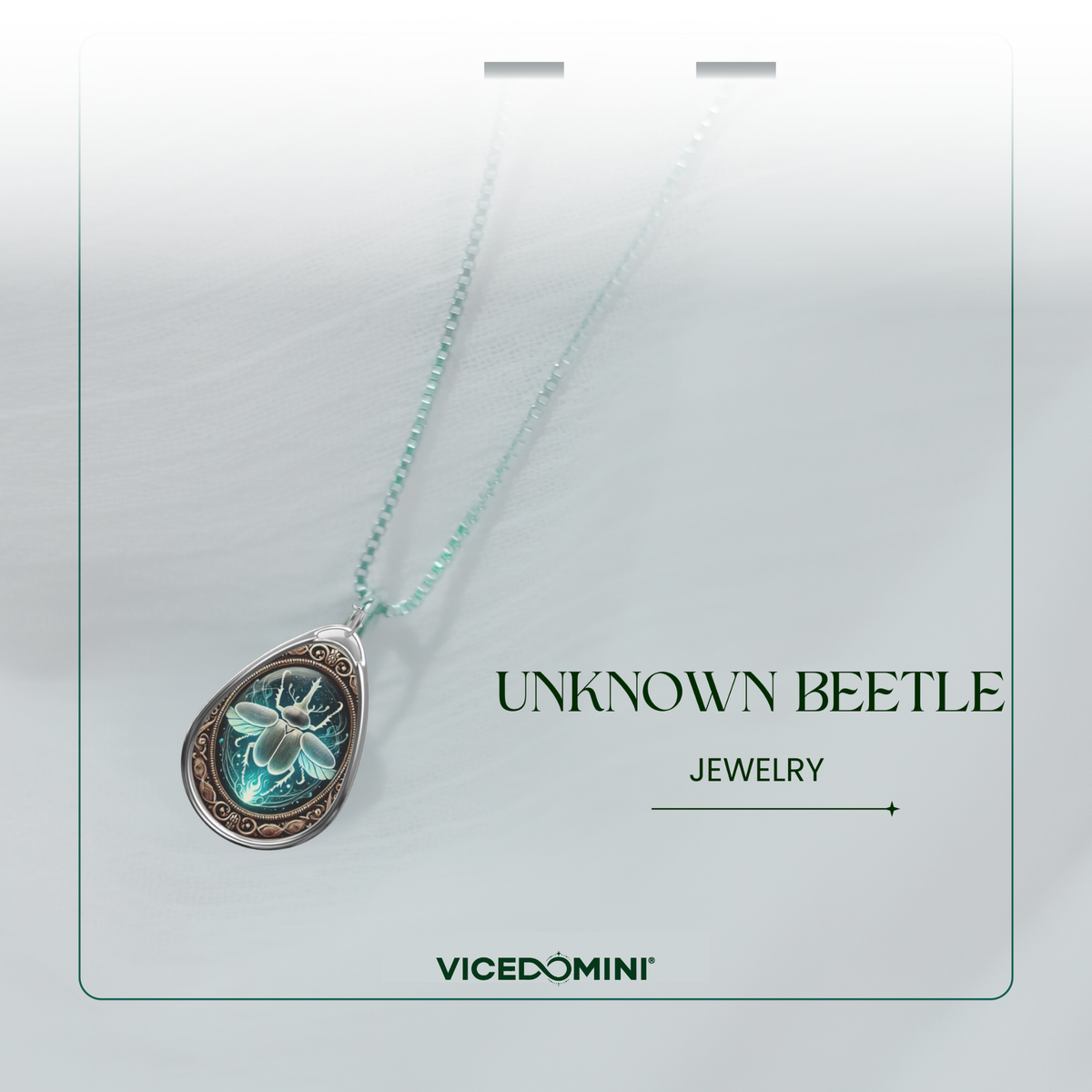 A teardrop-shaped pendant necklace on a delicate mint green chain, featuring a detailed beetle illustration in blue and white with a bronze-brown border. The necklace is presented on a white display card with the text 'UNKNOWN BEETLE JEWELRY' and the brand 'VICEDOMINI'.