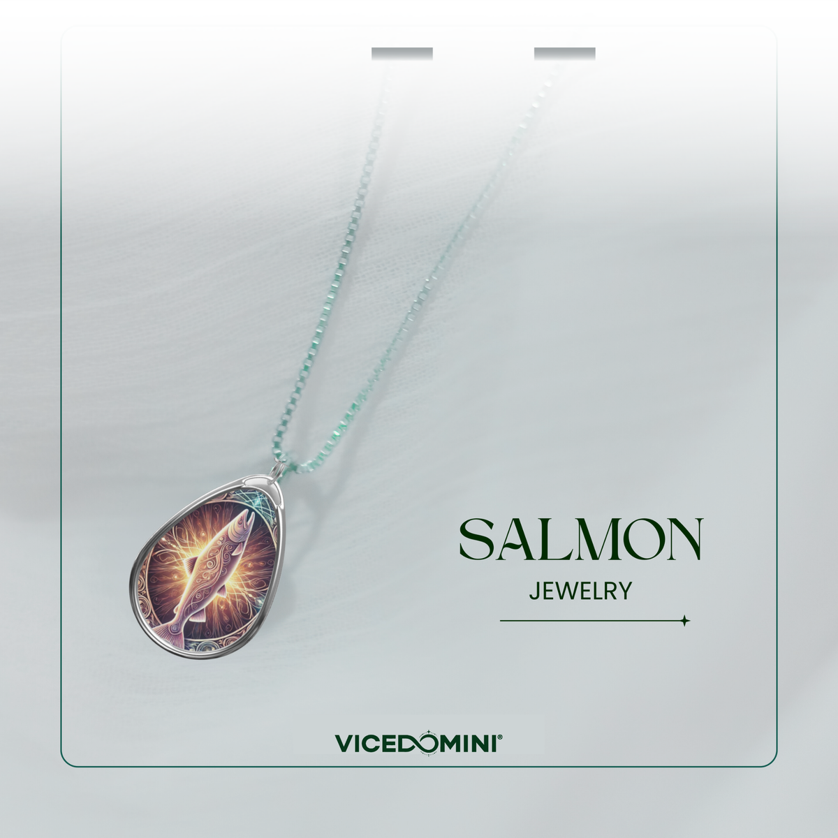 A stylish product display of the salmon necklace against a soft gradient background, featuring a shimmering teal chain. The text "SALMON JEWELRY" and "VICEDOMINI" is presented in a refined font.