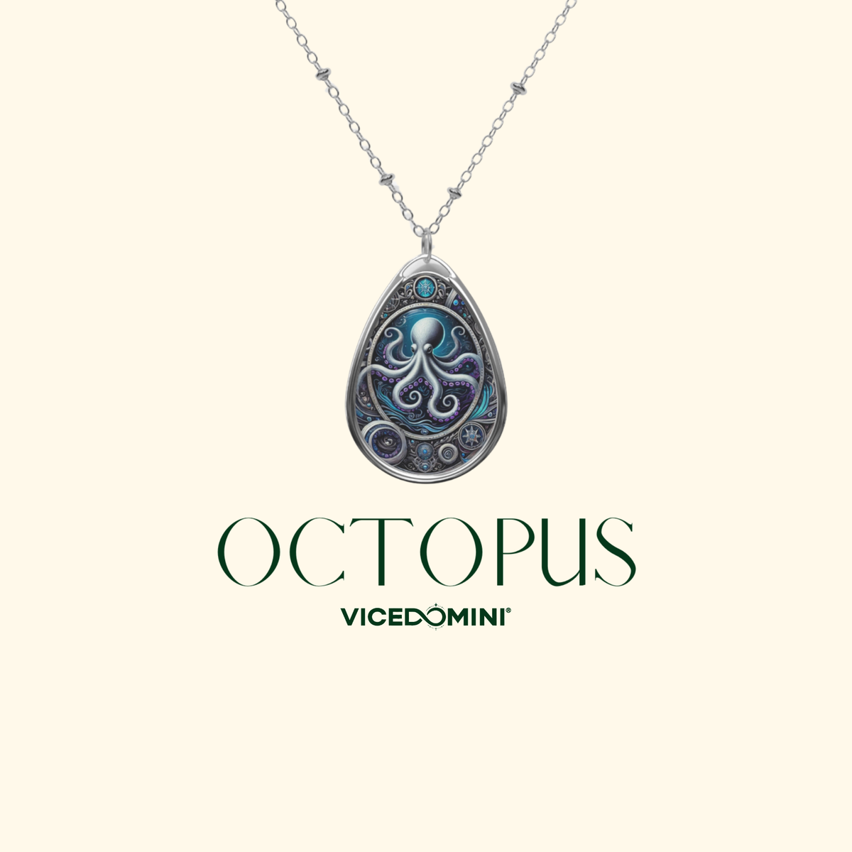 A Vicedomini necklace featuring a teardrop-shaped silver pendant with a detailed octopus design in shades of blue, purple, and silver, displayed on a light cream background with the brand name 'OCTOPUS' and 'VICEDOMINI' printed below.