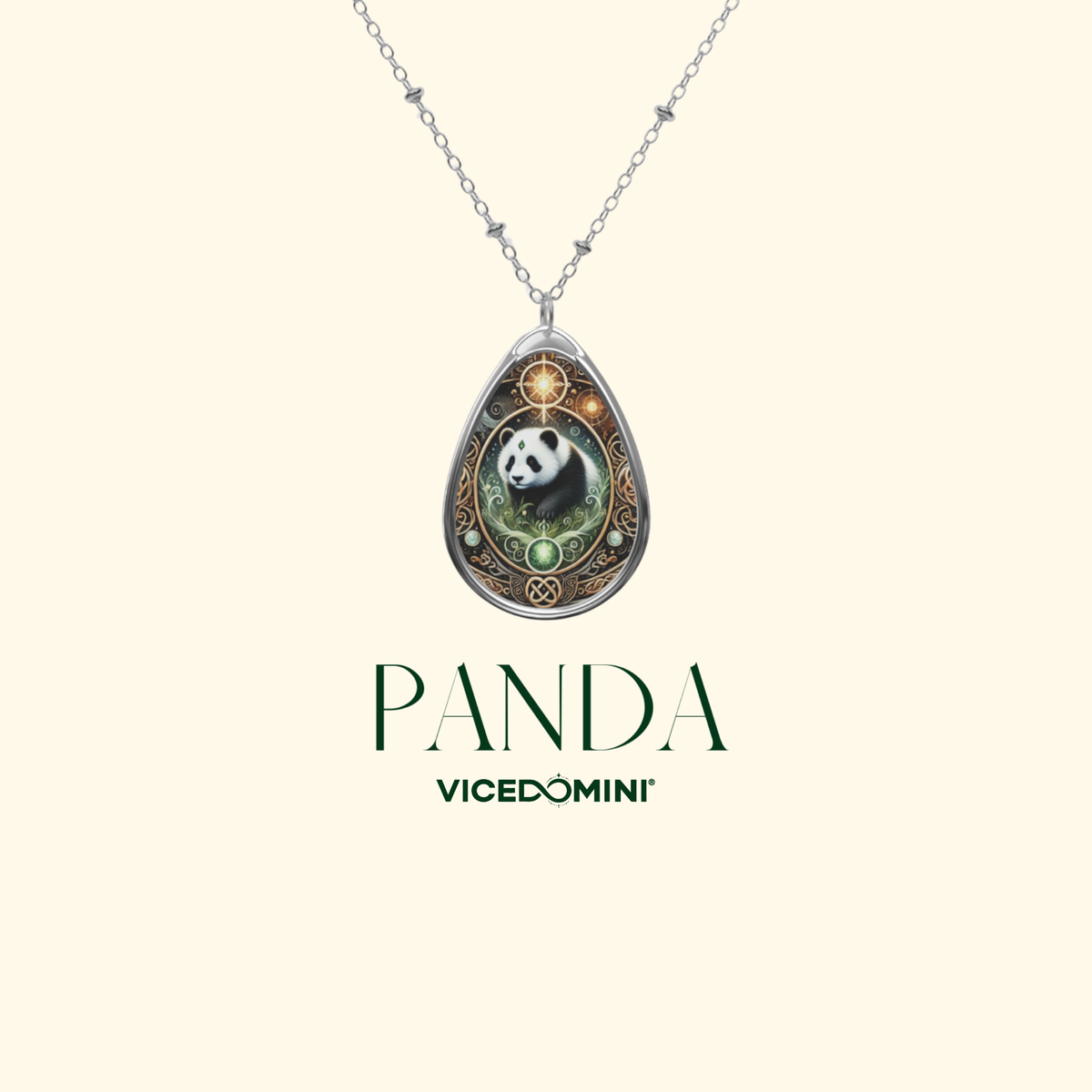 A silver teardrop pendant necklace featuring an illustrated panda surrounded by green and gold decorative details, shown on a light cream background with the text 'PANDA VICEDOMINI' below.