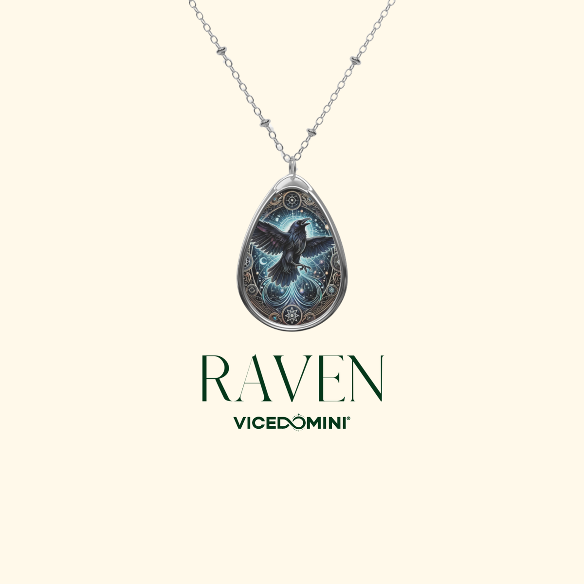 A silver chain necklace with a red panda pendant, intricately designed with cosmic patterns in a blend of red, blue, and gold hues. Displayed on a clean cream-colored background with "Raven" and "VICEDOMINI" branding.