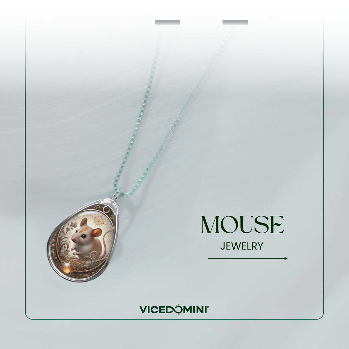A teardrop-shaped pendant necklace featuring an illustrated mouse on a light mint chain, displayed on a branded card that reads 'MOUSE JEWELRY' and 'VICEDOMINI'.